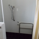 Jopen Motel bathroom shower with seat