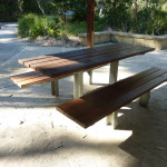 covered picnic tables with paths