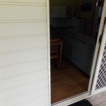 cabin entrance with lip and sliding security door
