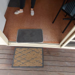 entrance with lip and door mats